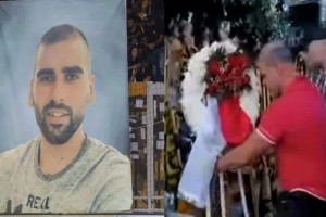 Συγκίνηση: Οπαδοί του Ολυμπιακού άφησαν κασκόλ και στεφάνι στο σημείο της δολοφονίας του Μιχάλη Κατσουρή (video)