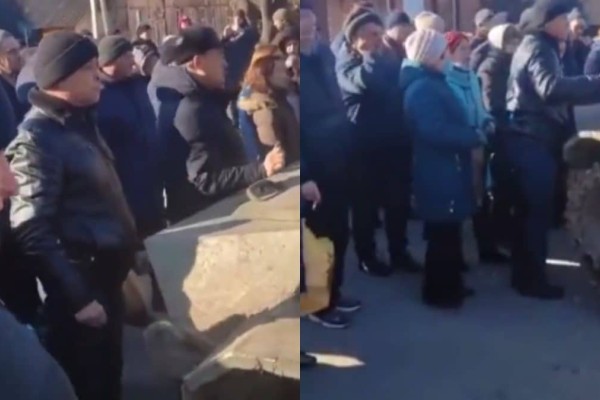 Ανατριχιαστικό βίντεο: Κάτοικοι στο Χάρκοβο στέκονται μπροστά σε ρωσικά άρματα και τραγουδούν τον εθνικό ύμνο (video)
