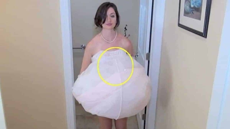 Αδιανόητο: Το νυφικό της νύφης φαίνεται παραφουσκωμένο στη μέση - Μόλις δείτε τι κρύβεται από κάτω, θα τραβάτε τα μαλλιά σας (Βίντεο)