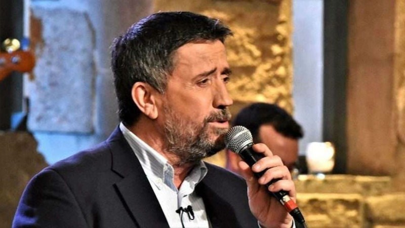 Σπύρος Παπαδόπουλος με μικρόφωνο