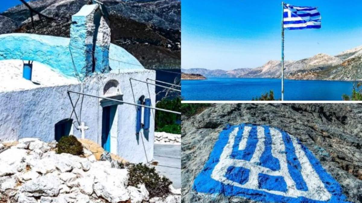 Αγία Κυριακή: Το εντυπωσιακό νησάκι με τη γαλανόλευκη σημαία ζωγραφισμένη στα βράχια