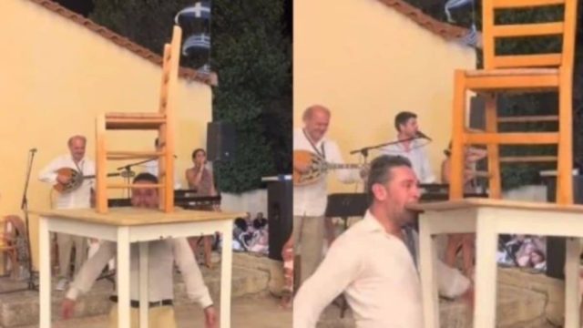 Τρομερός τύπος έγινε viral: Χορεύει ζεϊμπέκικο κρατώντας με τα δόντια του ένα τραπέζι και μια καρέκλα (video)