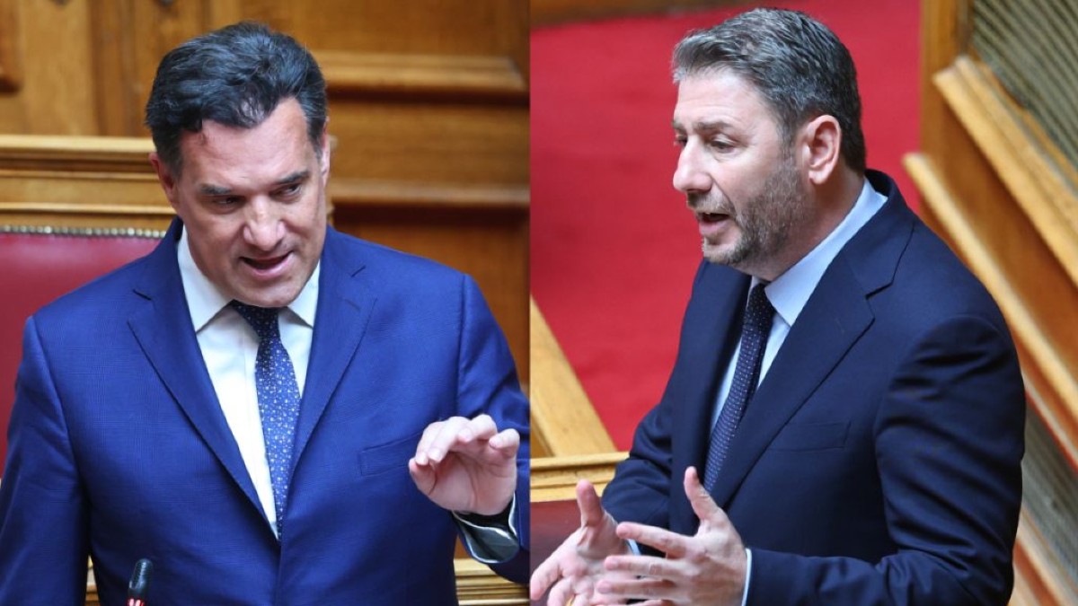 Μετωπική Γεωργιάδη - Ανδρουλάκη με φόντο μία σύμβαση ακινήτου