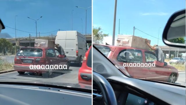 Εικόνα σοκ: Μεταφέρουν ψυγείο, χωρίς να είναι δεμένο! Αντί σχοινιού το κρατάει ένας κρεμασμένος από το παράθυρο!